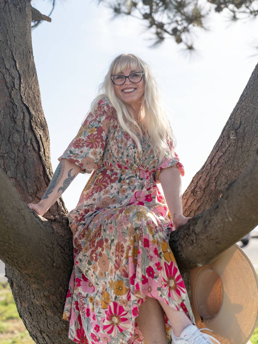 Rachael Wallin happy and in a tree